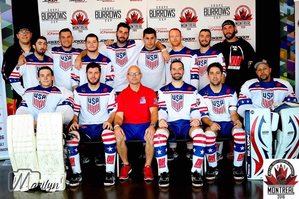 Team USA squad in white kits with the trophy
